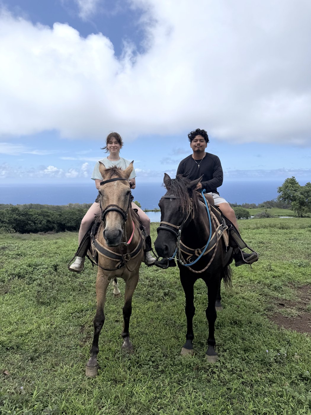 Marco and his wife on horseback in Hawaii